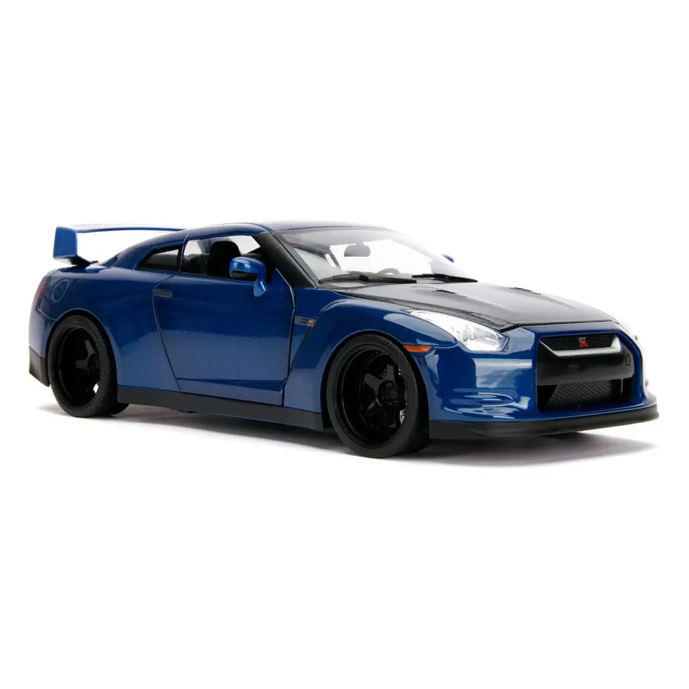 The Fast and Furious Diecast Modell Hollywood Rides 1/18 2009 Nissan Skyline GT-R R35 mit Brian Figur Produktfoto