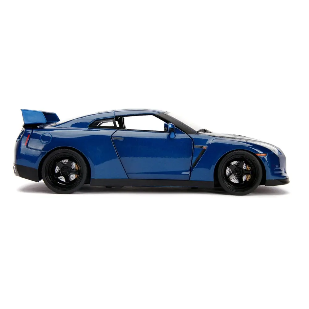 The Fast and Furious Diecast Modell Hollywood Rides 1/18 2009 Nissan Skyline GT-R R35 mit Brian Figur Produktfoto
