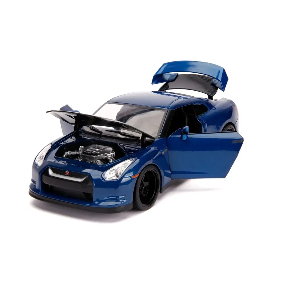 The Fast and Furious Diecast Modell Hollywood Rides 1/18 2009 Nissan Skyline GT-R R35 mit Brian Figur Produktfoto