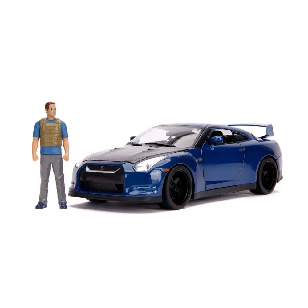 The Fast and Furious Diecast Modell Hollywood Rides 1/18 2009 Nissan Skyline GT-R R35 mit Brian Figur Produktfoto