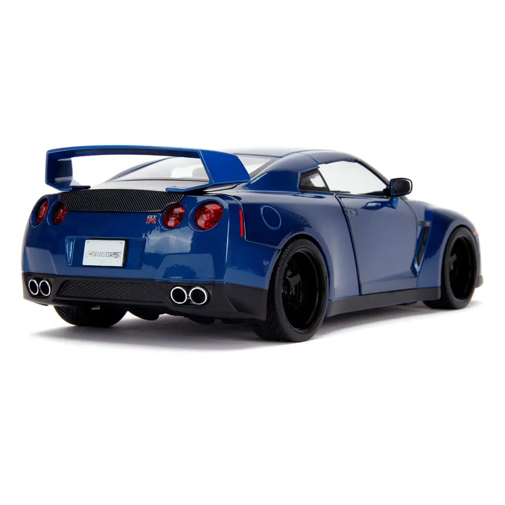 The Fast and Furious Diecast Modell Hollywood Rides 1/18 2009 Nissan Skyline GT-R R35 mit Brian Figur Produktfoto