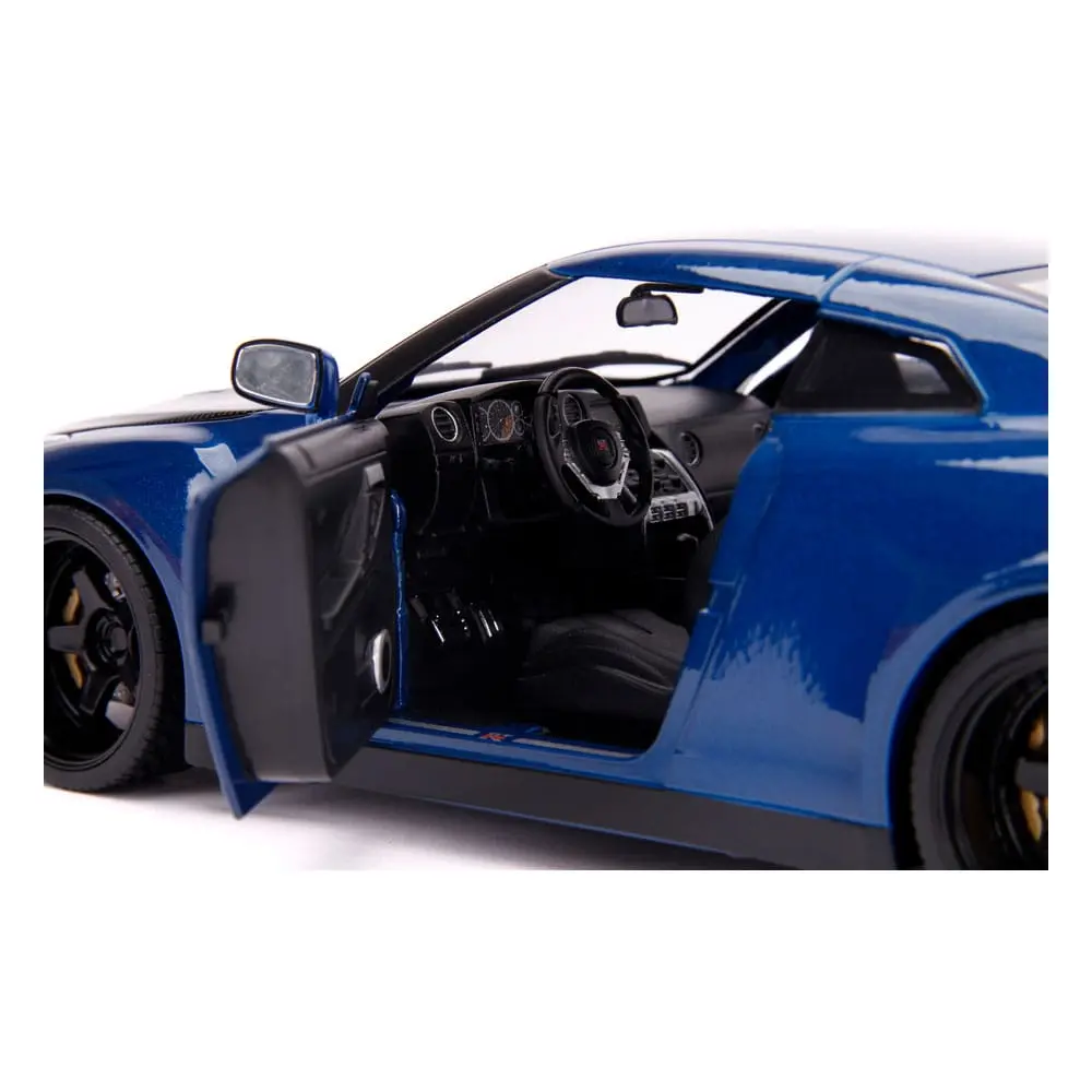 The Fast and Furious Diecast Modell Hollywood Rides 1/18 2009 Nissan Skyline GT-R R35 mit Brian Figur Produktfoto