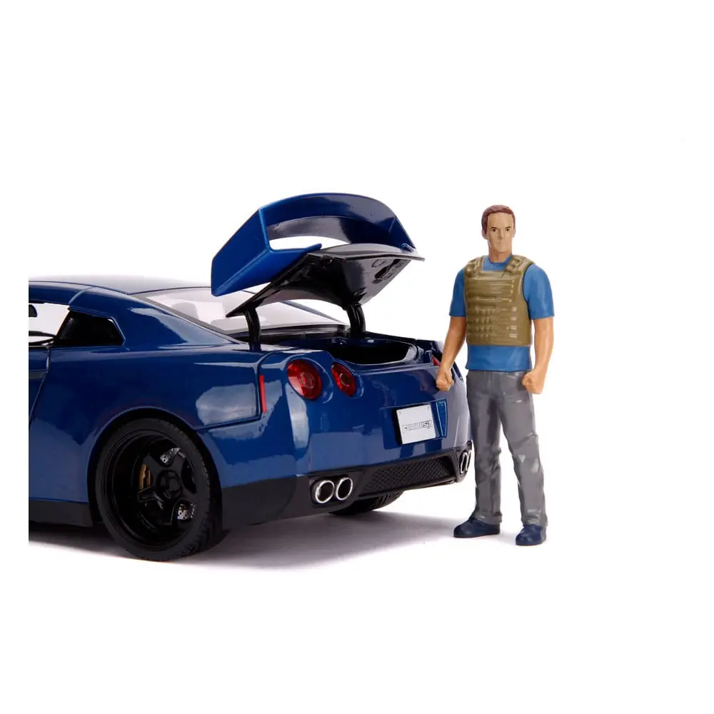 The Fast and Furious Diecast Modell Hollywood Rides 1/18 2009 Nissan Skyline GT-R R35 mit Brian Figur Produktfoto