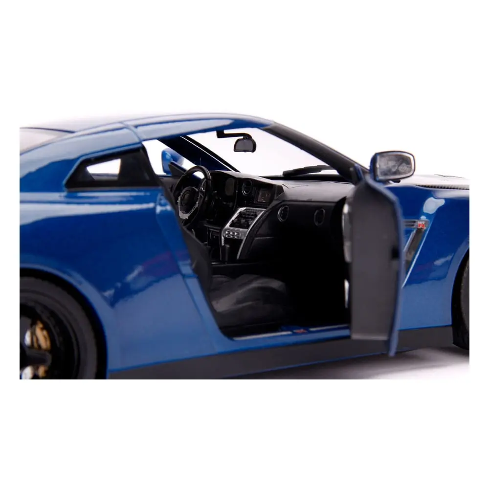 The Fast and Furious Diecast Modell Hollywood Rides 1/18 2009 Nissan Skyline GT-R R35 mit Brian Figur Produktfoto