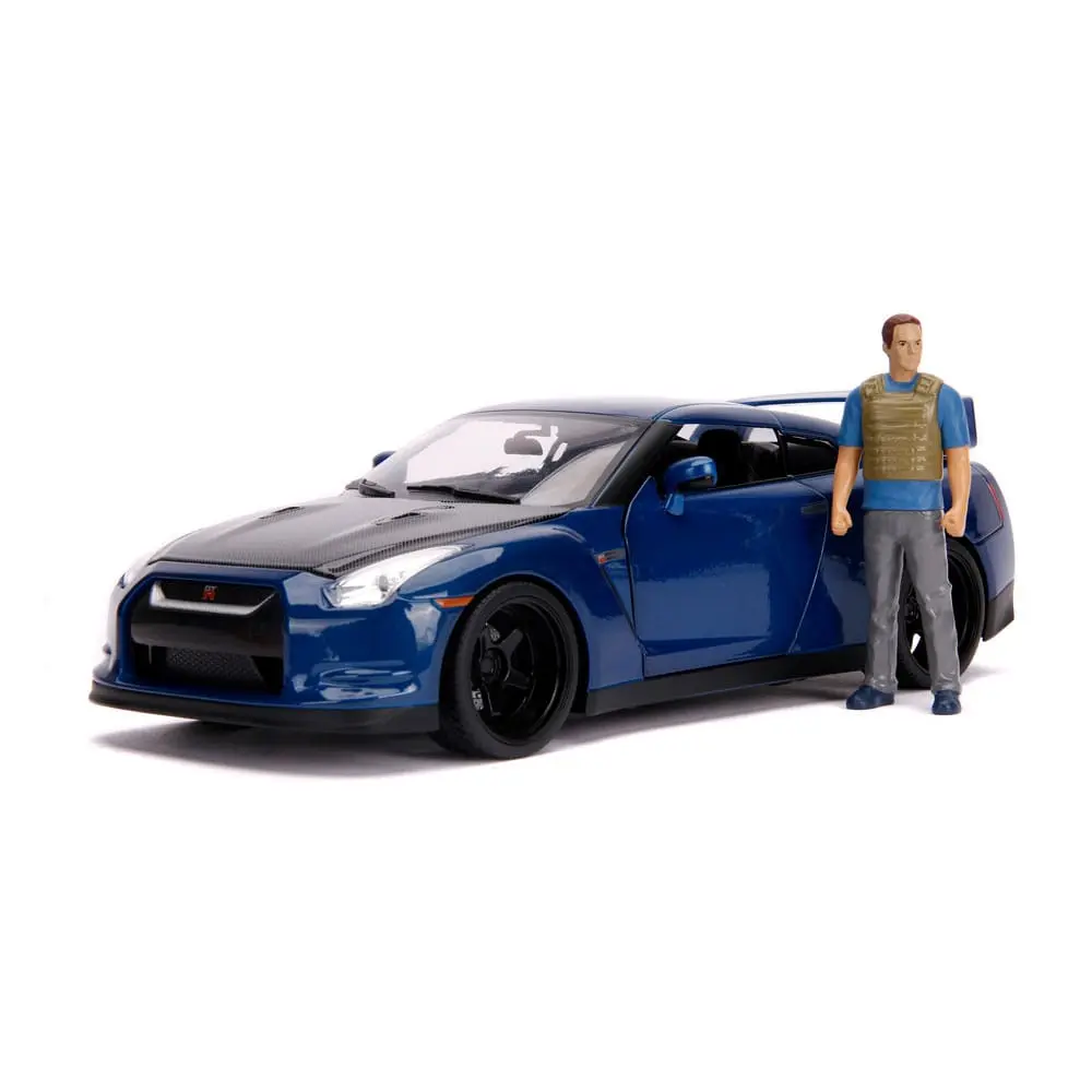 The Fast and Furious Diecast Modell Hollywood Rides 1/18 2009 Nissan Skyline GT-R R35 mit Brian Figur Produktfoto