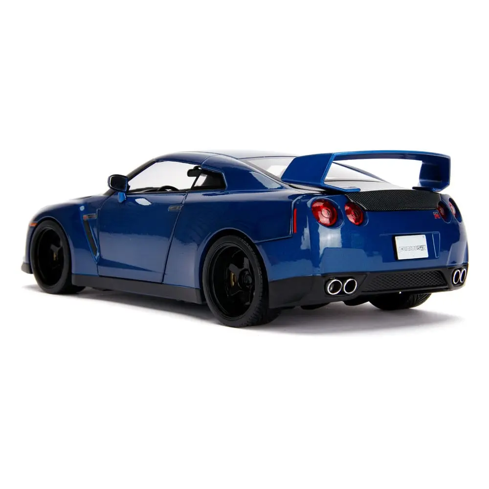 The Fast and Furious Diecast Modell Hollywood Rides 1/18 2009 Nissan Skyline GT-R R35 mit Brian Figur Produktfoto